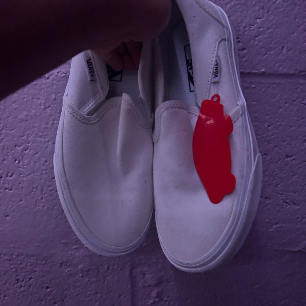 Vans Classic White Slip-Ons with Red Tag